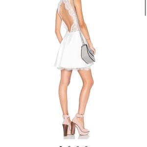Backless white cocktail dress